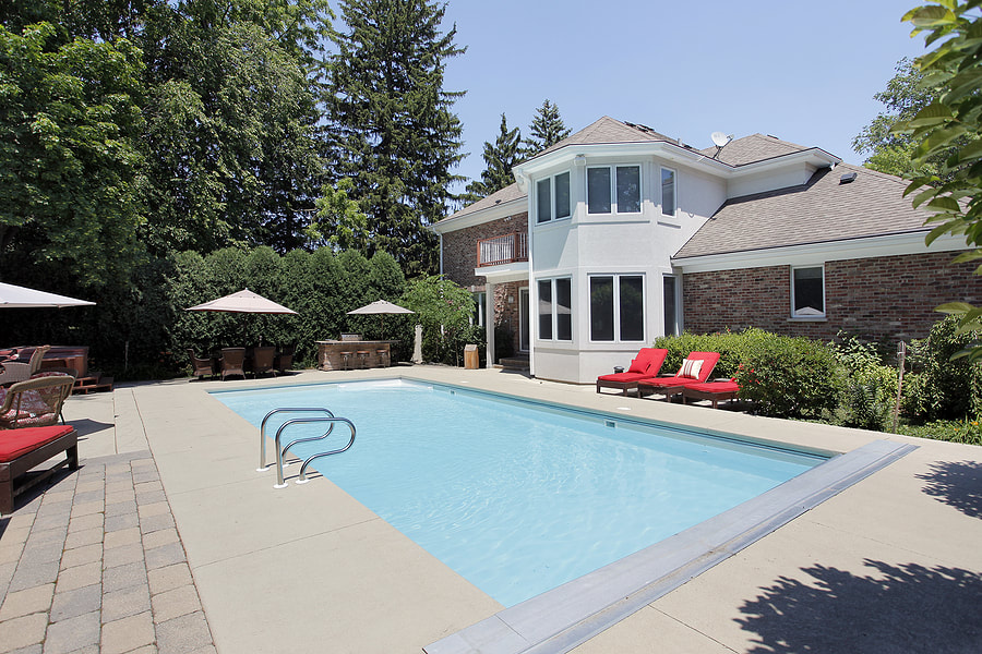 nice large pool with pool chairs 