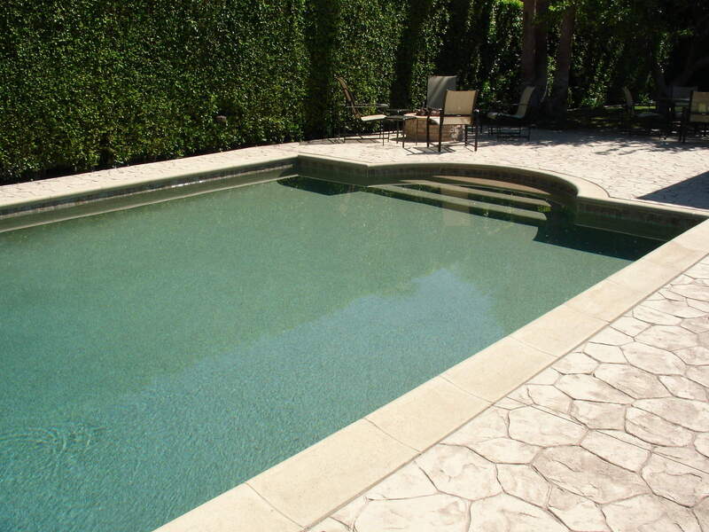 rectangle pool with concrete deck pool